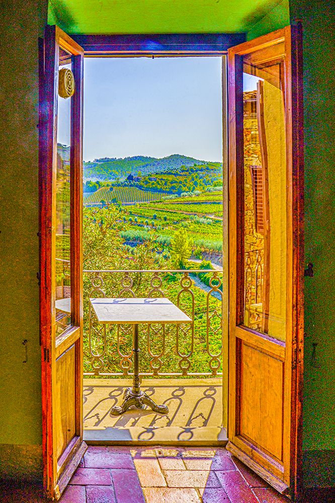 Greve in Chianti, Tuscany, Italy. doorway with vineyards and cypress trees surrounding small town. art print by Murray McCallum for $57.95 CAD