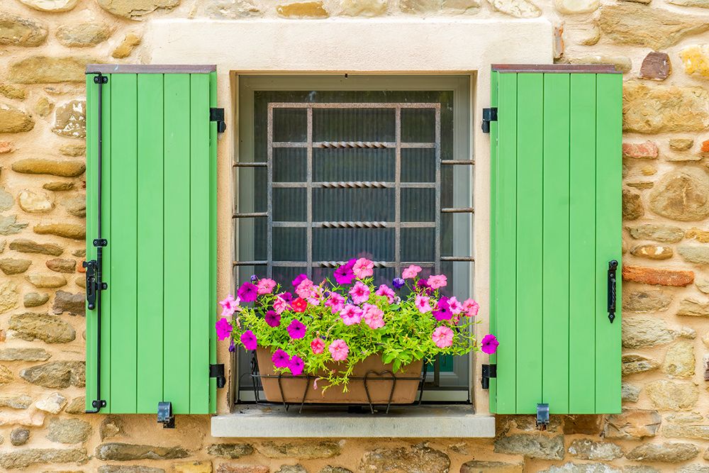 Brisighella, Emilia Romagna, Italy. Colorful flower basket in a shuttered window of a stone house. art print by Murray McCallum for $57.95 CAD