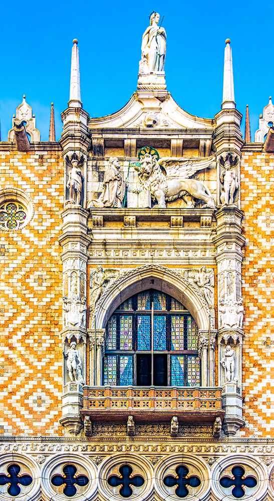 Via Porta del Frumento, Doges Palace, Venice, Italy. Carvings and statues above the entrance. art print by Murray McCallum for $57.95 CAD