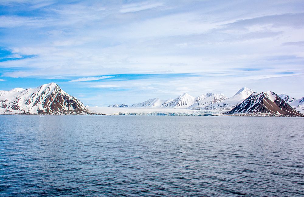Arctic Ocean, Svalbard Islands, Norway. Icy mountain island and glacier in the ocean water. art print by Murray McCallum for $57.95 CAD