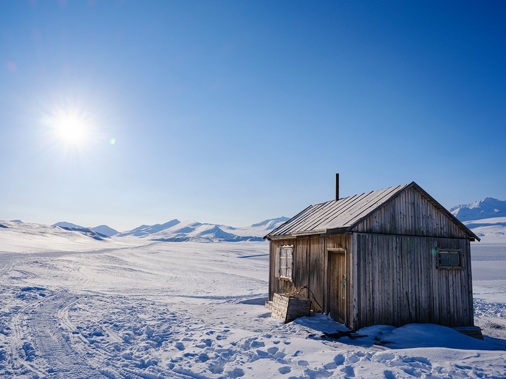 Traditional hut at frozen Gronfjorden-Island of SpitsbergenScandinavia-Norway-Svalbard art print by Martin Zwick for $57.95 CAD