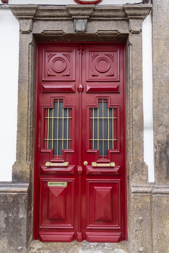 Terceira Island, Azores, Portugal. Red door on a building in Angra do Heroismo. art print by Emily M. Wilson for $57.95 CAD
