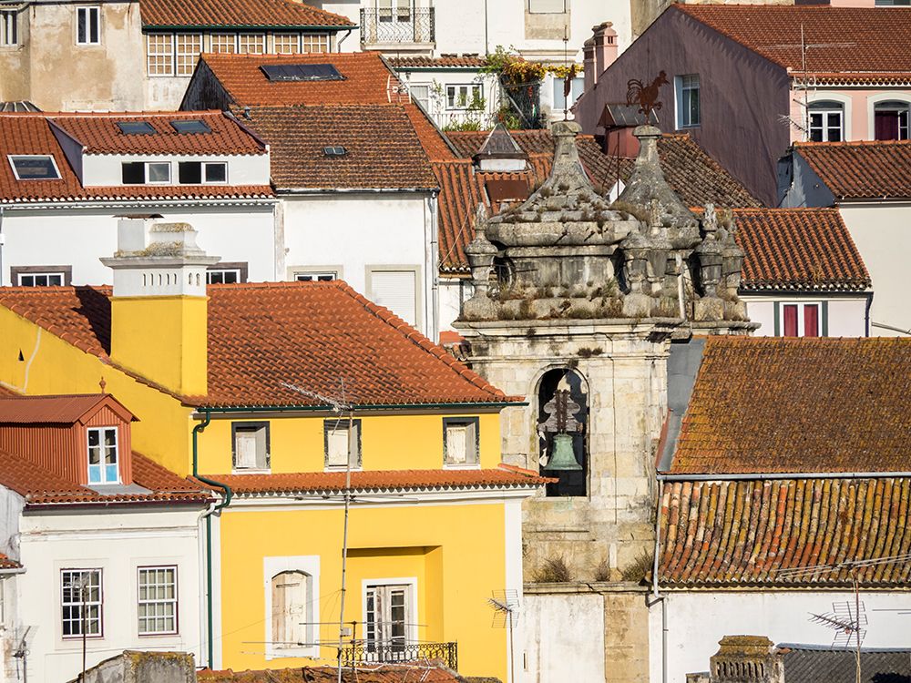 Rooftops of the town of Coimbra and the old bell tower of St Bartholomew church art print by Julie Eggers for $57.95 CAD