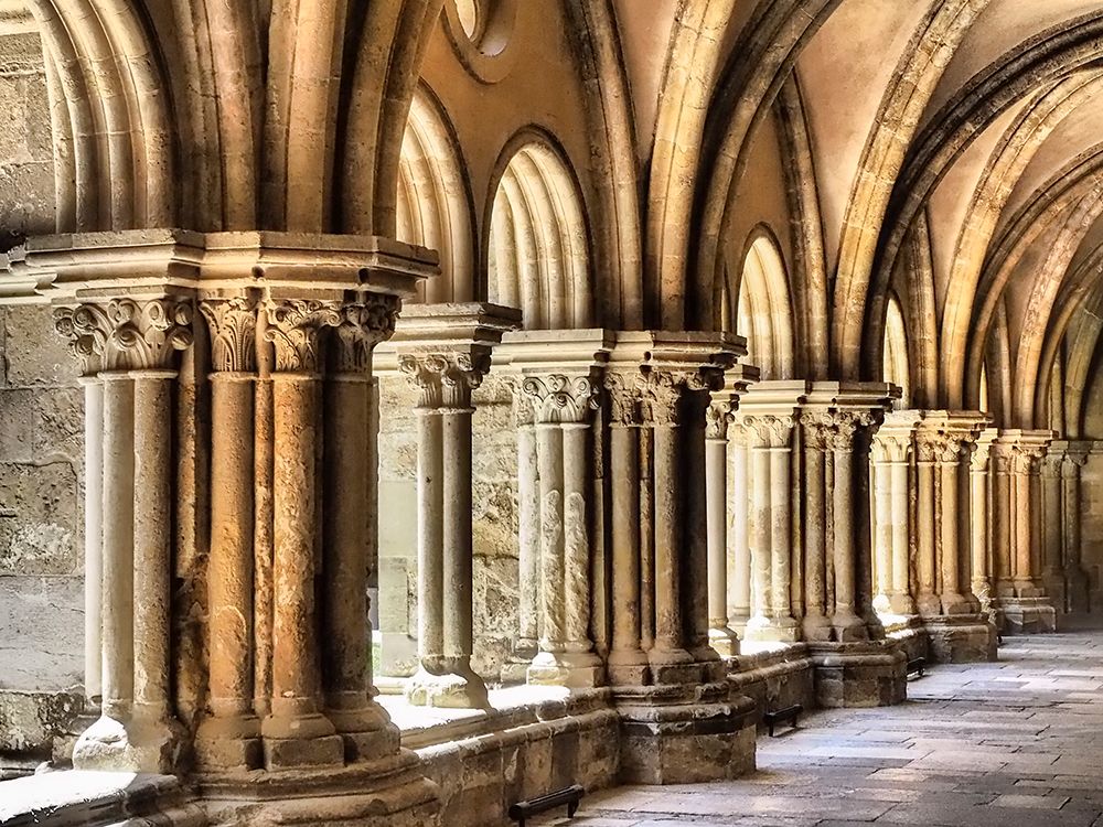 The early 12 century cloister in the old Cathedral (Se Velha) art print by Julie Eggers for $57.95 CAD