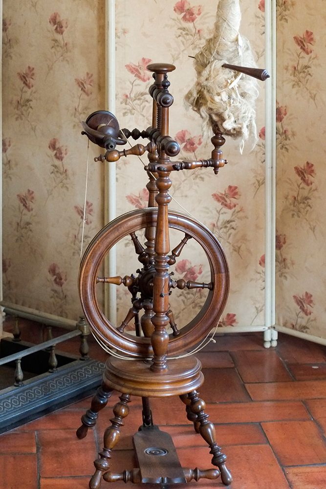 Sintra-Portugal. National Palace interior. Spinning wheel by the fireplace (Editorial Use Only) art print by Julien McRoberts for $57.95 CAD