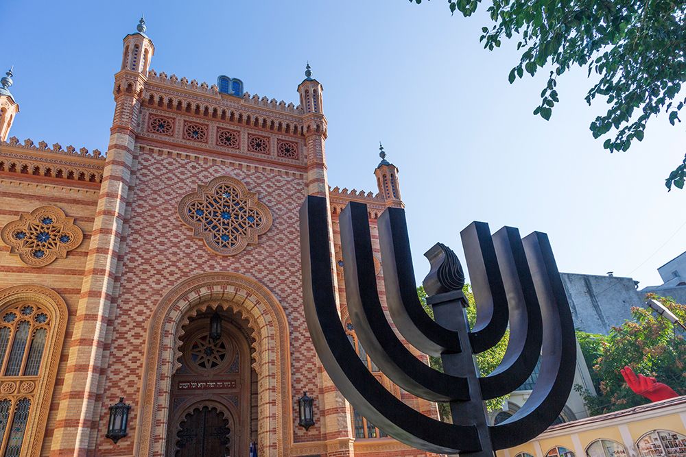 Romania-Bucharest-Choral Temple Synagogue Tempelgasse Menorah sculpture in front art print by Emily M. Wilson for $57.95 CAD