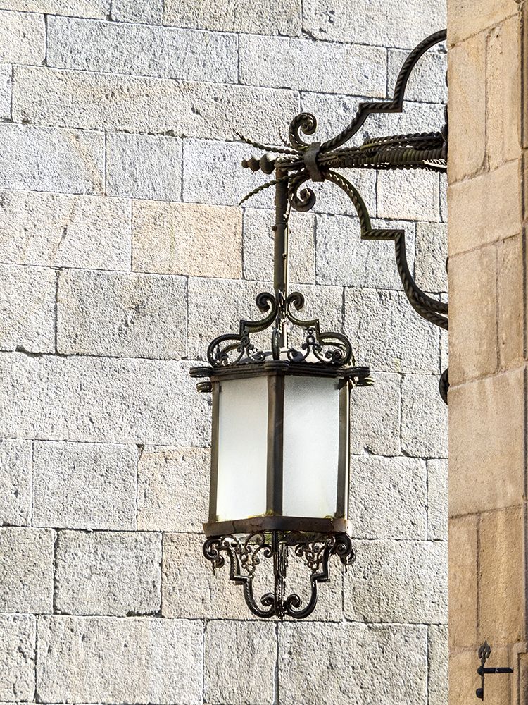 Old street lamp hanging in the streets of Santiago de Compostela art print by Julie Eggers for $57.95 CAD