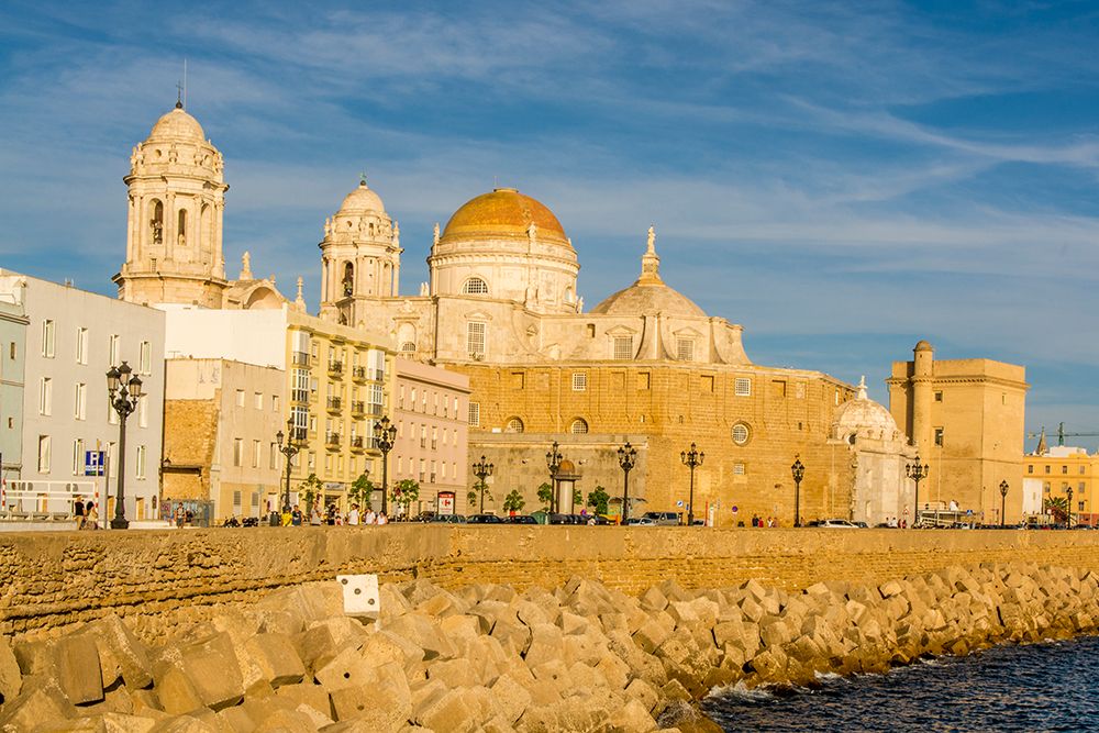 Catedral de la Santa Cruz (Cathedral of the Holy Cross) along San Sebastian Bay, Cadiz, Spain. art print by Michael DeFreitas for $57.95 CAD