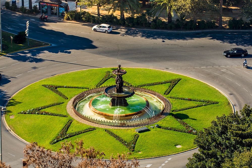 Las Tres Ninfas fountain in the roundabout in Plaza del General Torrijos, Malaga, Spain. art print by Michael DeFreitas for $57.95 CAD