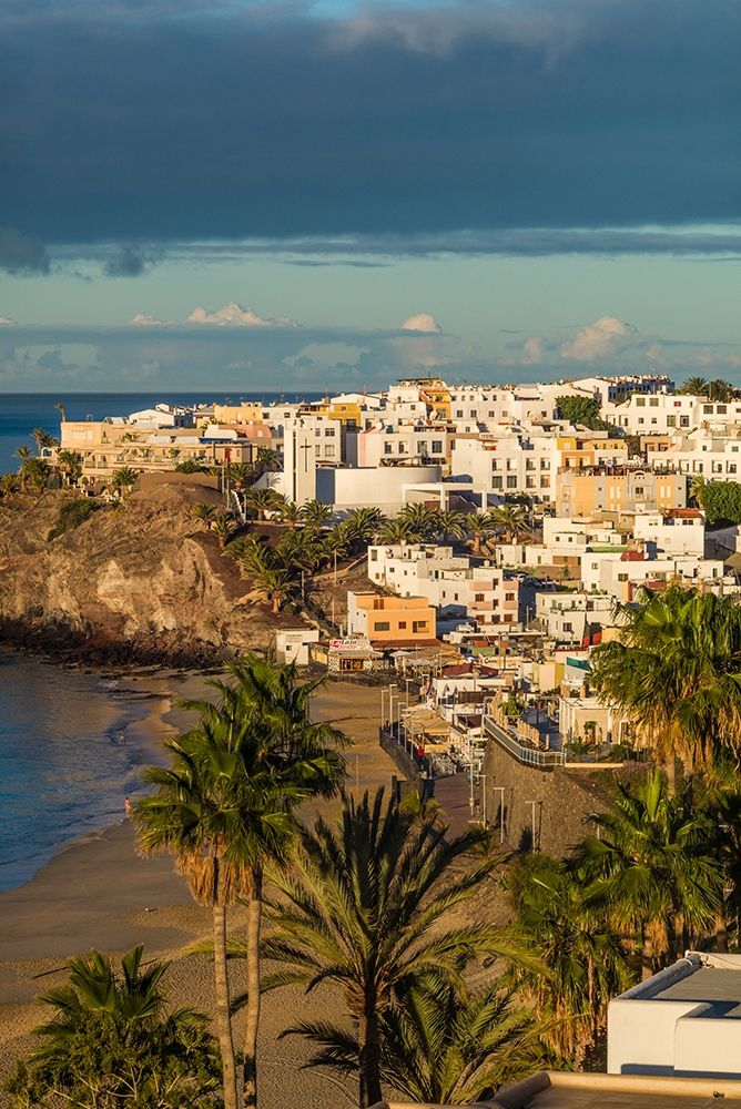 Canary Islands-Fuerteventura Island-Morro Jable-high angle view of Playa de la Cebada beach-dawn art print by Walter Bibikow for $57.95 CAD