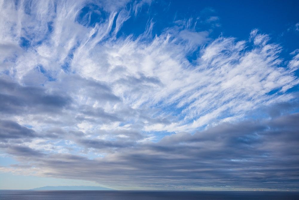 Canary Islands-La Palma Island-Puerto Naos-dramatic sky and view towards El Hierro Island art print by Walter Bibikow for $57.95 CAD