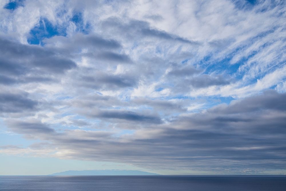 Canary Islands-La Palma Island-Puerto Naos-dramatic sky and view towards El Hierro Island art print by Walter Bibikow for $57.95 CAD