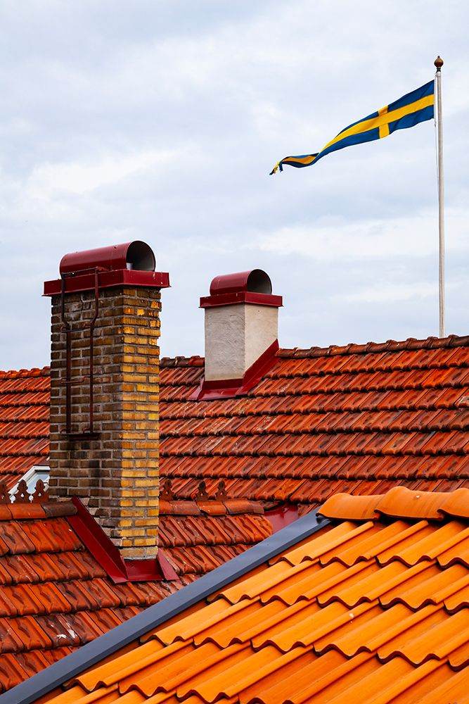 Tiled roofs of homes at Backviken on the island of Ven Sweden art print by Rob Casey for $57.95 CAD