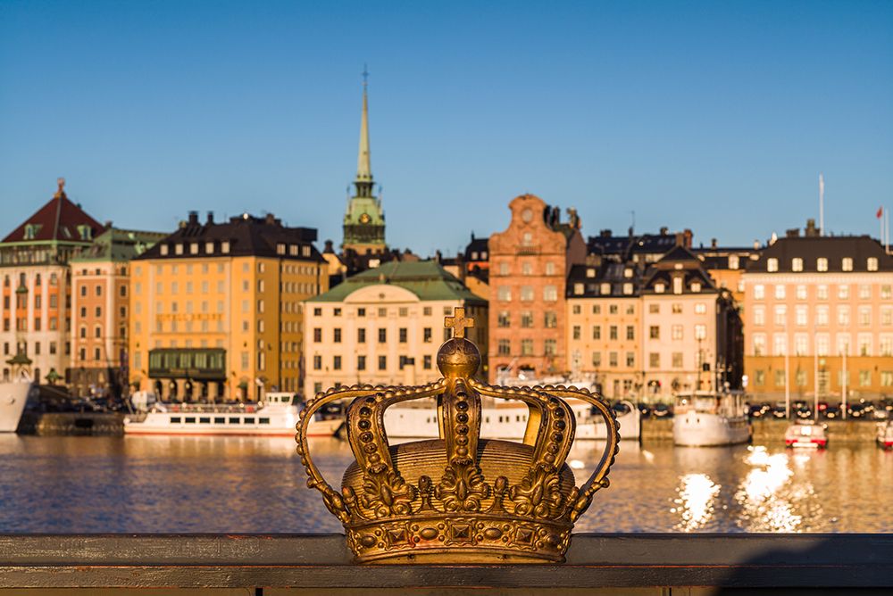 Sweden-Stockholm-Gamla Stan-Old Town-old town skyline and crown on the Skeppsholmsbron bridge art print by Walter Bibikow for $57.95 CAD