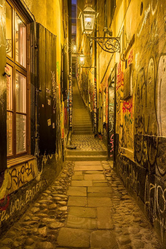 Sweden-Stockholm-Gamla Stan-Old Town-Marten Trotzigs Grand-narrowest street in Stockholm-evening art print by Walter Bibikow for $57.95 CAD