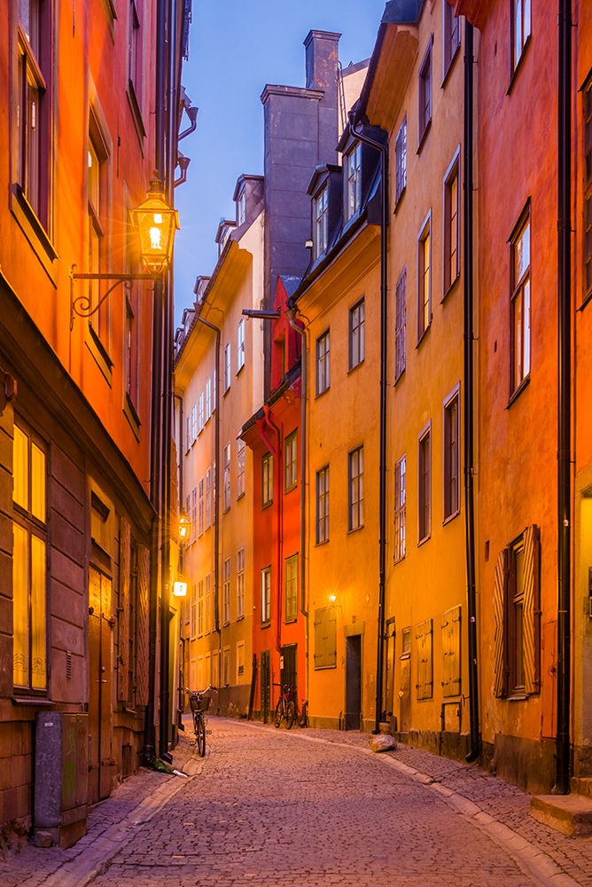 Sweden-Stockholm-Gamla Stan-Old Town-Royal Palace-old town street-dusk art print by Walter Bibikow for $57.95 CAD