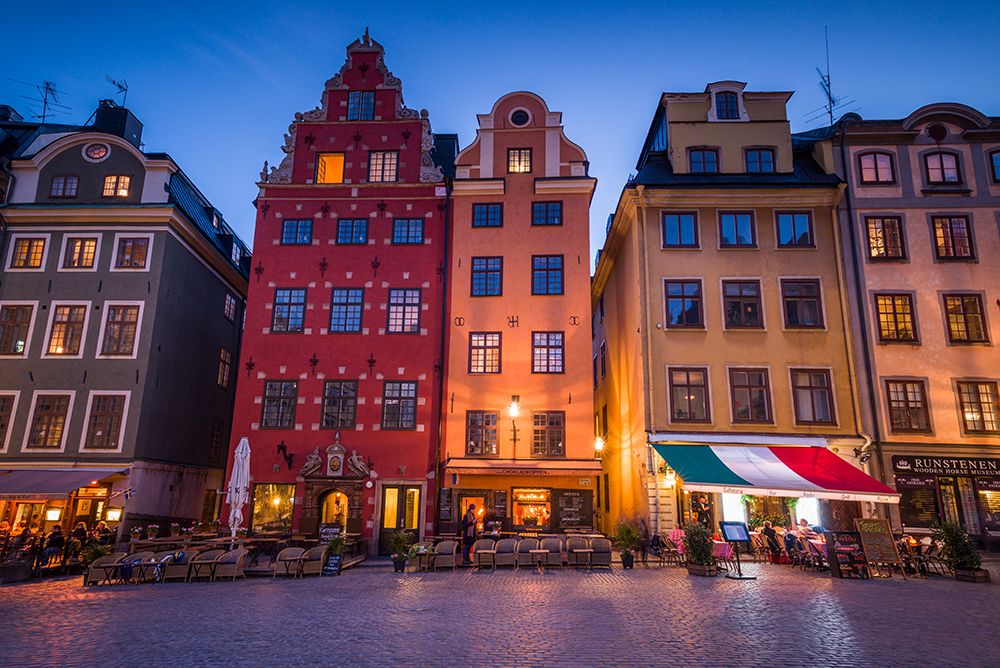 Sweden-Stockholm-Gamla Stan-Old Town-buildings of the Stortorget Square-dusk art print by Walter Bibikow for $57.95 CAD