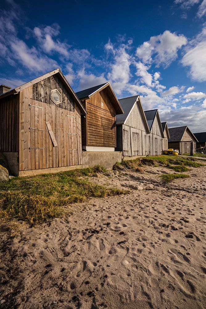 Sweden-Gotland Island-Djupvik-fishing shacks art print by Walter Bibikow for $57.95 CAD