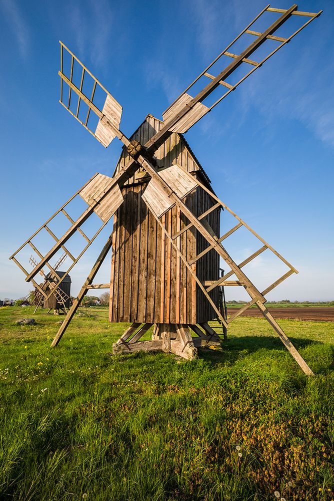 Sweden-Oland Island-Lerkaka-antique wooden windmills art print by Walter Bibikow for $57.95 CAD