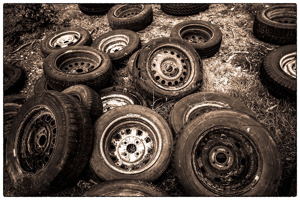 Sweden-Smaland-Ryd-Kyrko Mosse Car Cemetery-former junkyard now pubic park-old tires art print by Walter Bibikow for $57.95 CAD