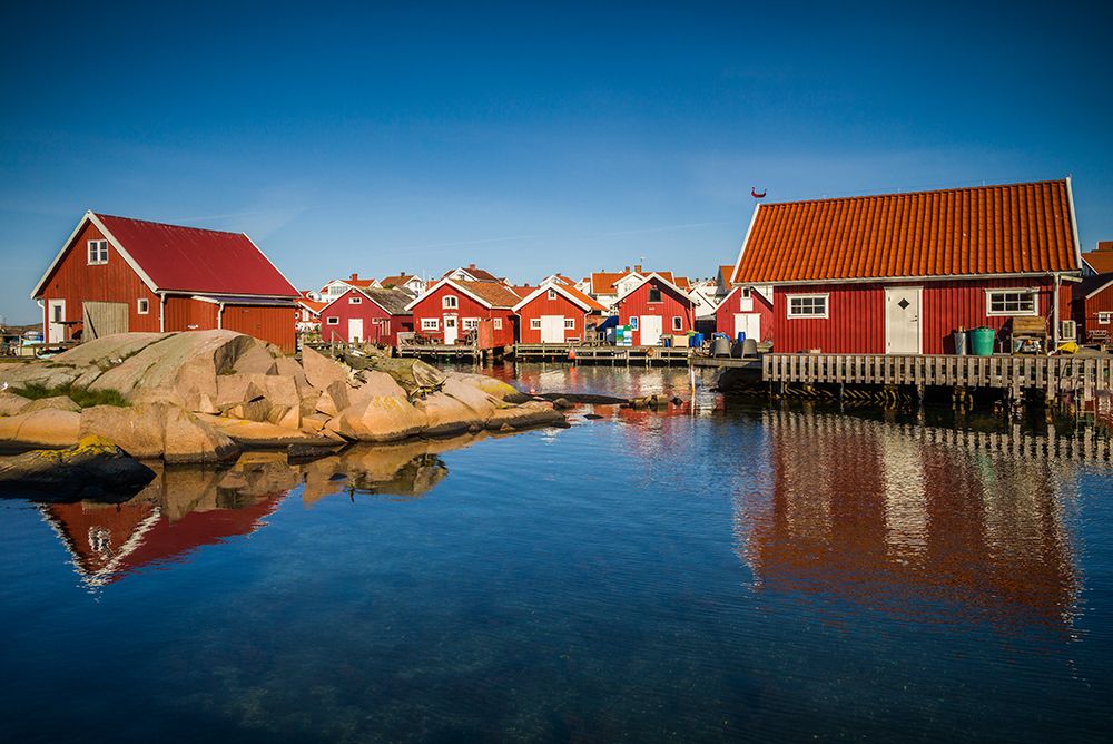 Sweden-Bohuslan-Kungshamn-red fishing shacks in the Fisketangen-old fishermans neighborhood art print by Walter Bibikow for $57.95 CAD