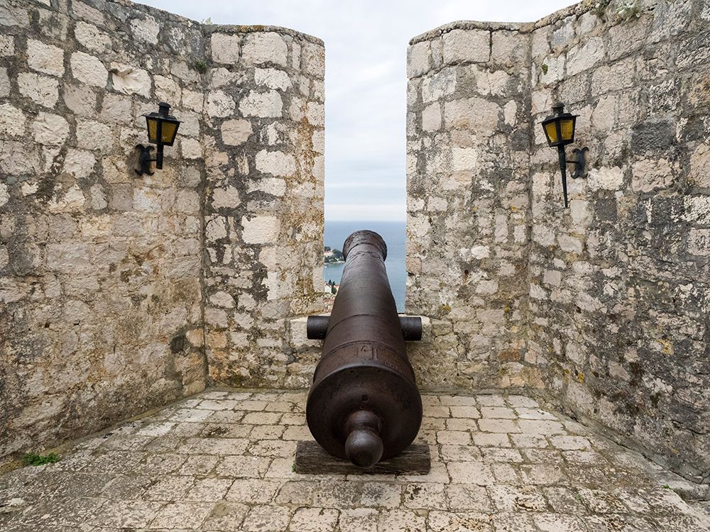 Croatia-Hvar. Cannon overlooking the town and coastline from Hvar Fortica or Spanjola Fortress. art print by Julie Eggers for $57.95 CAD