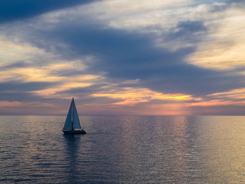 Croatia-Rovinj-Istria. Sailing boat on the Adriatic Sea outside the harbor of Rovinj at sunset. art print by Julie Eggers for $57.95 CAD