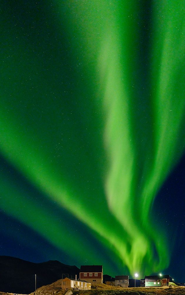 Northern Lights over settlement Kuummiit. Ammassalik area in East Greenland- Danish Territory art print by Martin Zwick for $57.95 CAD