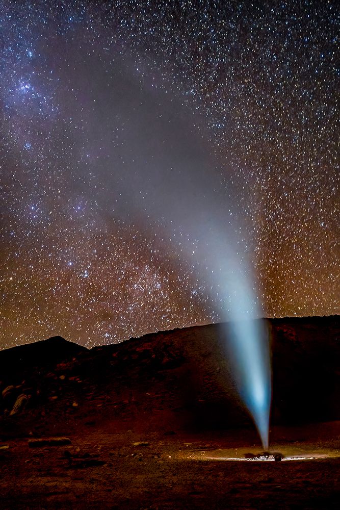 Bolivia. Geyser erupting in Bolivias Sol de Manana with Milky Way behind. art print by Murray McCallum for $57.95 CAD