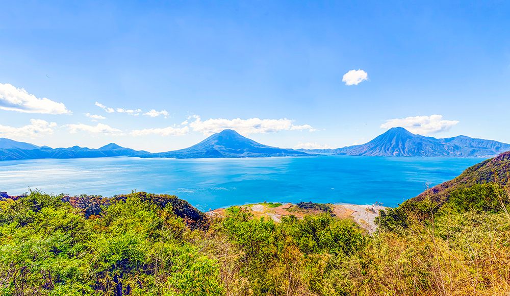 Guatemala. Lake Atitlan, with Volcan Atitlan, Toliman and San Pedro with Volcan Fuego on the left. art print by Murray McCallum for $57.95 CAD