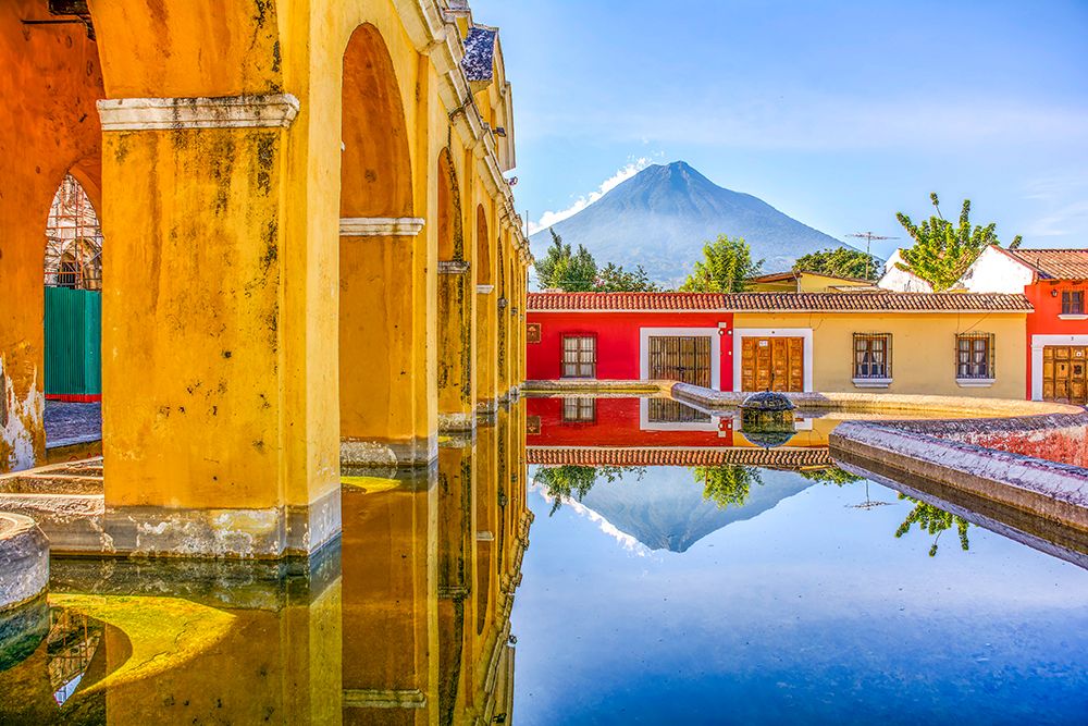 Antigua, Guatemala. 18th Century public wash basins with Volcan Agua in the background. art print by Murray McCallum for $57.95 CAD