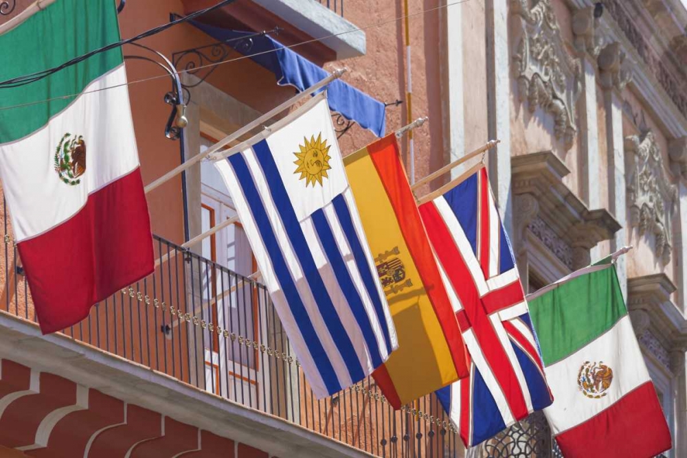 Mexico, Guanajuato Flags displayed from balcony art print by Don Paulson for $57.95 CAD