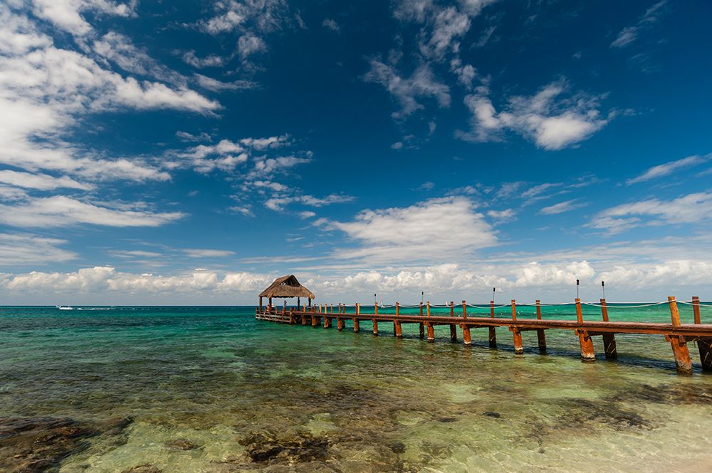 A pier and a palapa on a beach on Cozumel Island-Quintana Roo-Mexico art print by Sergio Pitamitz for $57.95 CAD