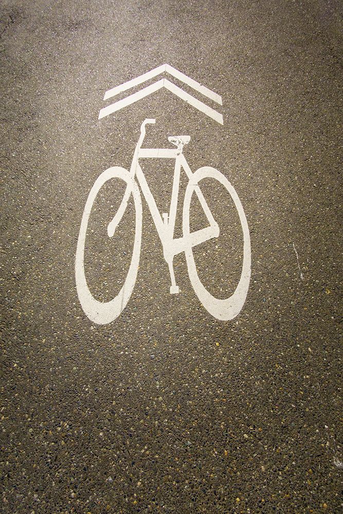 Bike path sign on road. art print by Rob Casey for $57.95 CAD