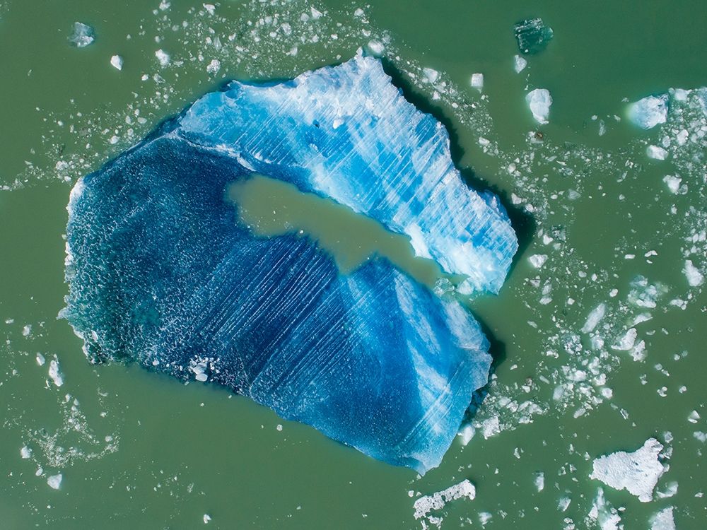Alaska-Tracy Arm-Aerial view of floating iceberg calved from South Sawyer Glacier in Tracy Arm art print by Paul Souders for $57.95 CAD