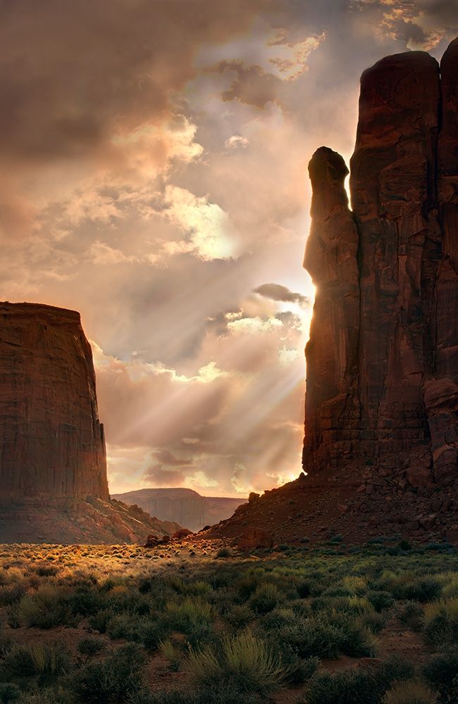 Light rays filter down into Monument Valley-on the Arizona and Utah border art print by Steve Mohlenkamp for $57.95 CAD