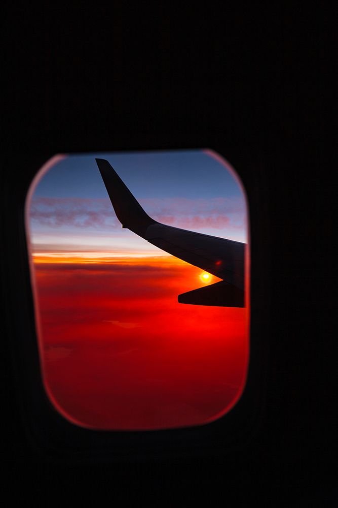 Aerial sunset view from airplane window above California, USA art print by Rob Casey for $57.95 CAD