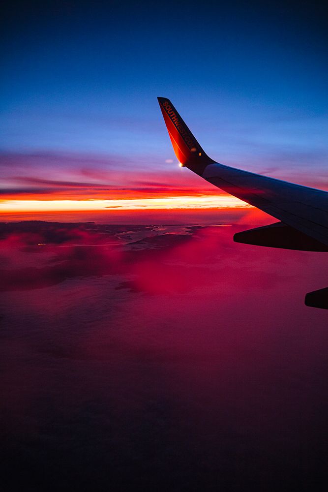 Aerial sunset view from airplane window above California, USA art print by Rob Casey for $57.95 CAD