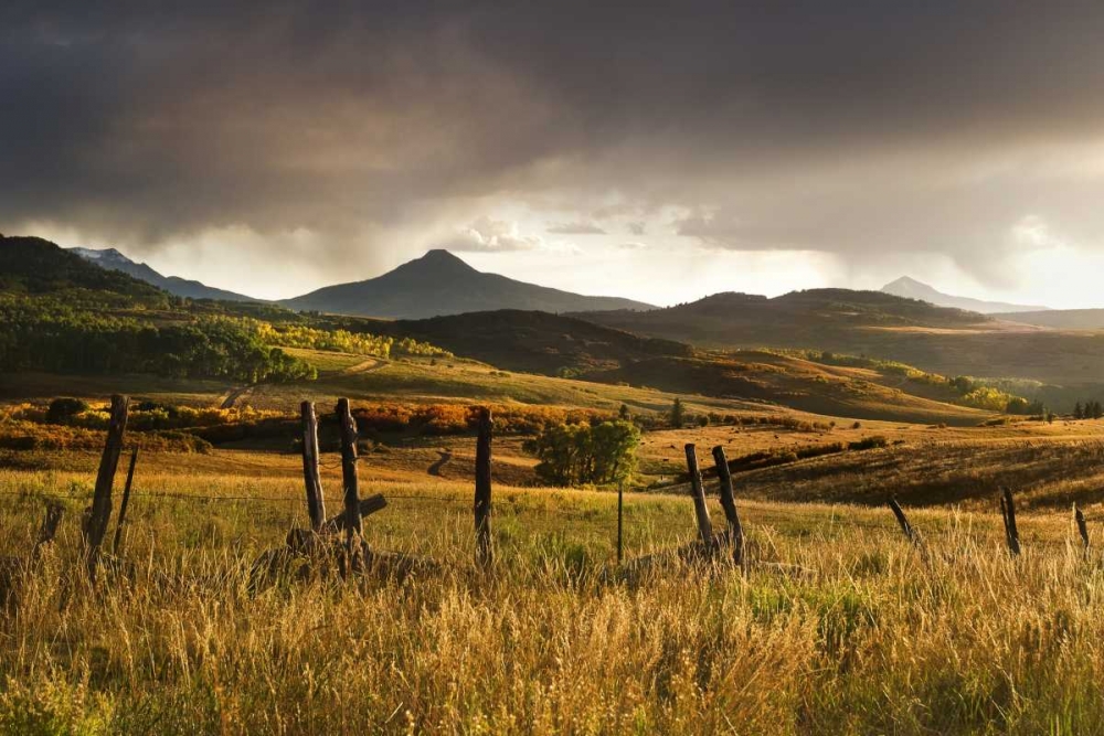 CO, San Juan Mts Landscape and fence at sunset art print by Marie Bush for $57.95 CAD