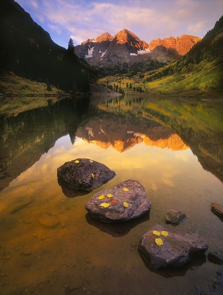 Aspen leaves signify the end of Fall and the beginning of winter at the maroon bells art print by Steve Mohlenkamp for $57.95 CAD