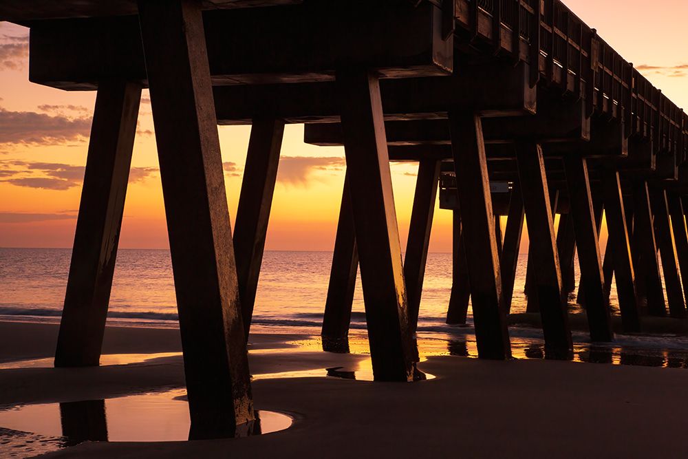 USA- Georgia- Tybee Island. Pier silhouetted in the sunrise. art print by Joanne Wells for $57.95 CAD