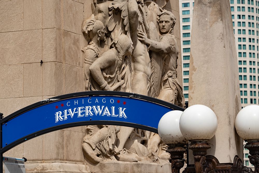 Riverwalk signage along the Chicago River in downtown Chicago with Michigan Avenue bas-relief art print by Alan Klehr for $57.95 CAD