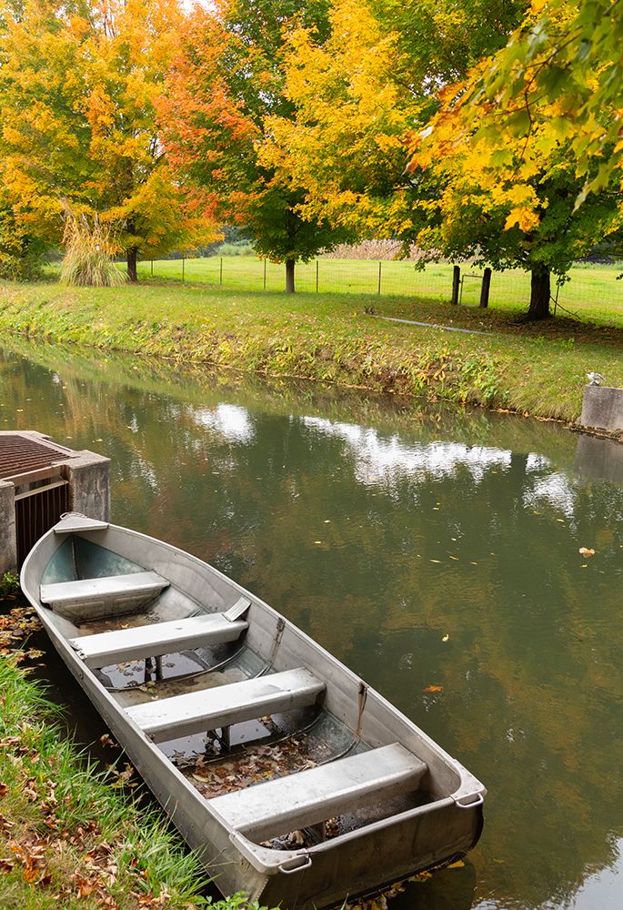 Rowboat on river at Millers Cider Mill in Amish Country in Middlebury, northern Indiana art print by Alan Klehr for $57.95 CAD