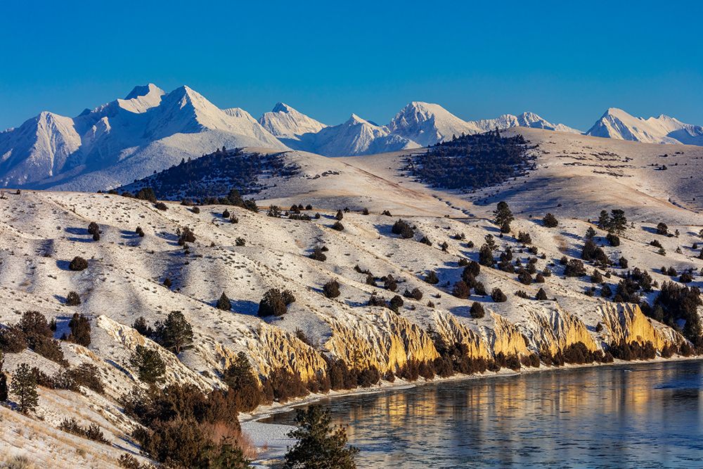 The Flathead River after a fresh snowfall in the Mission Valley-Montana-USA art print by Chuck Haney for $57.95 CAD