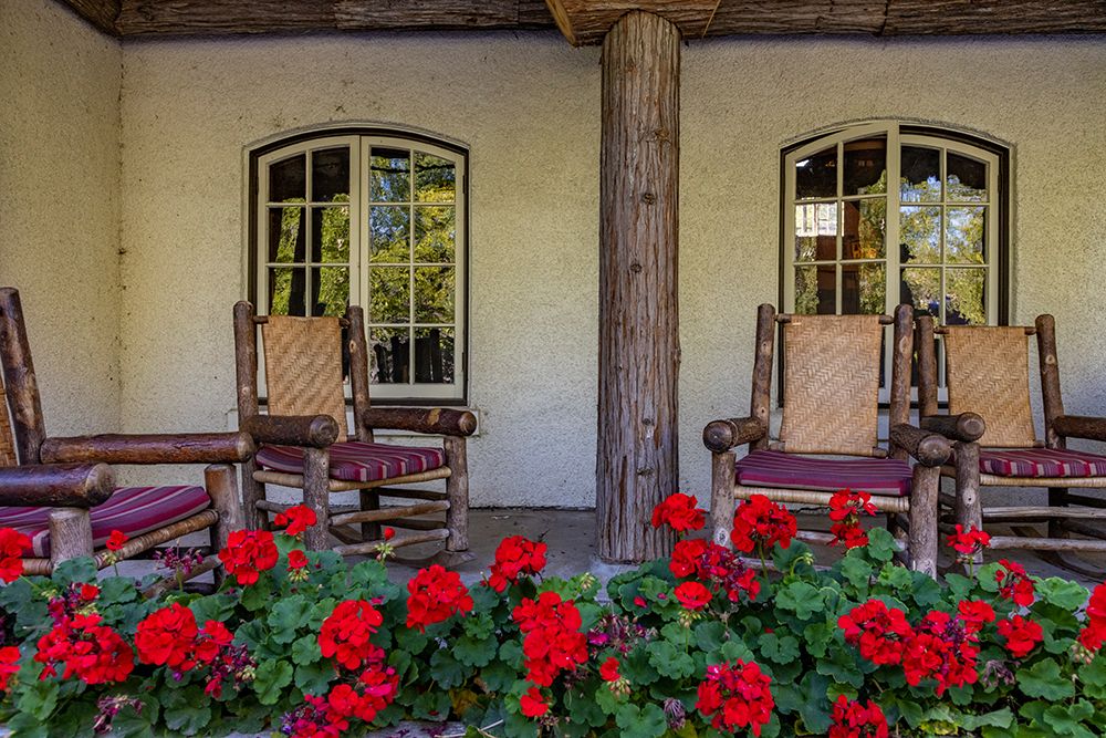 Lounge chairs at Lake McDonald Lodge in Glacier National Park-Montana-USA art print by Chuck Haney for $57.95 CAD