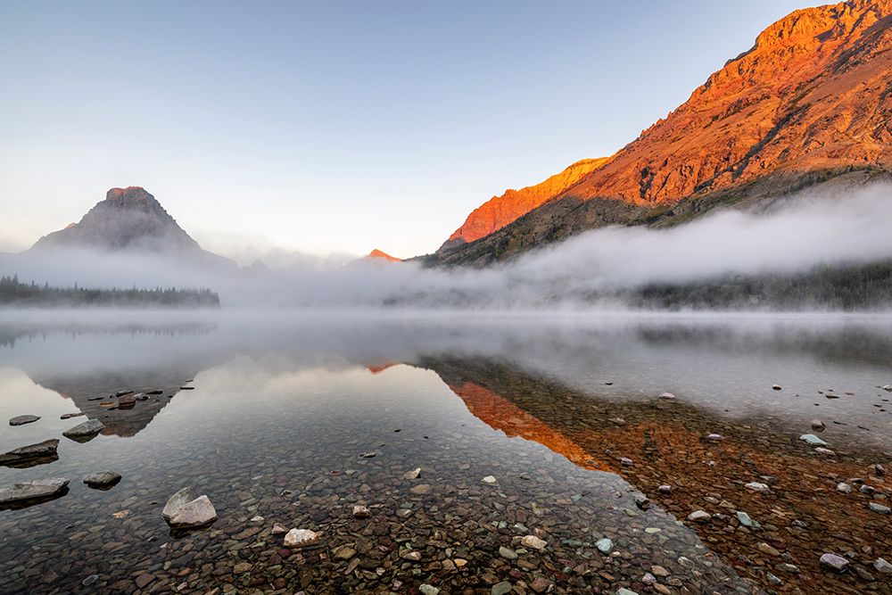 Foggy sunrise over Two Medicine Lake in Glacier National Park-Montana-USA art print by Chuck Haney for $57.95 CAD