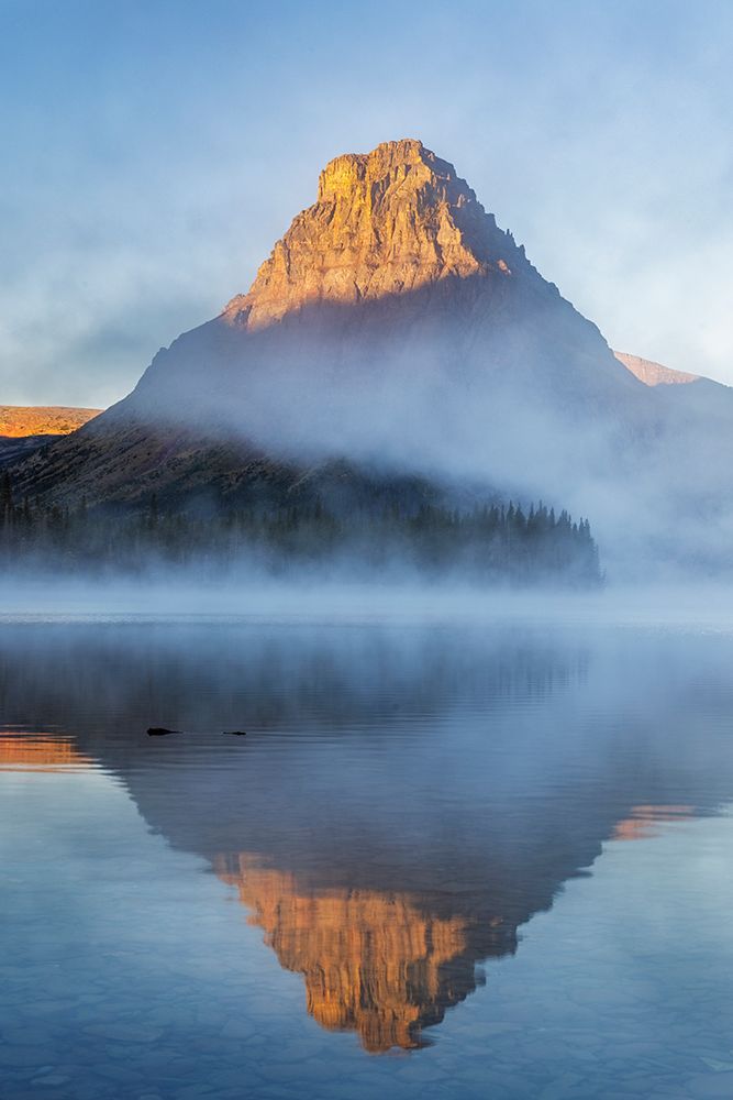 Sinopah Mountain and foggy sunrise over Two Medicine Lake in Glacier National Park-Montana-USA art print by Chuck Haney for $57.95 CAD