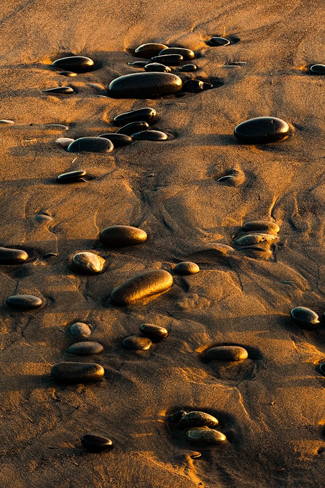 Pattern of smooth round stones on beach at sunset-Olympic National Park-Washington State art print by Adam Jones for $57.95 CAD