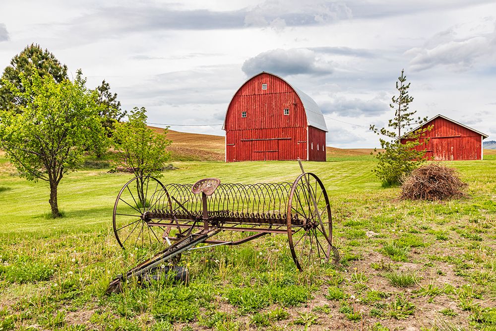 Albion-Washington State-USA-Red barns and antique farm equipment in the Palouse hills art print by Emily Wilson for $57.95 CAD