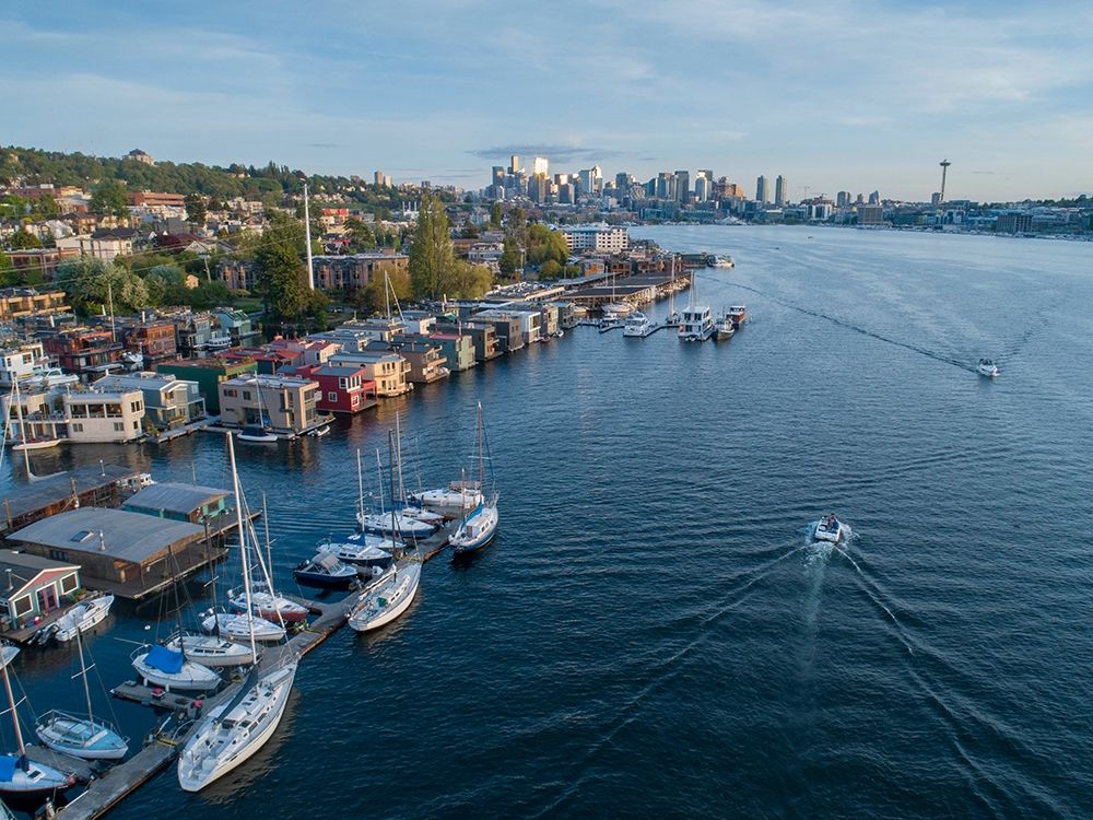 Aerial view of sailboats and houseboats on Lake Union with downtown Seattle in the background art print by Greg Probst for $57.95 CAD